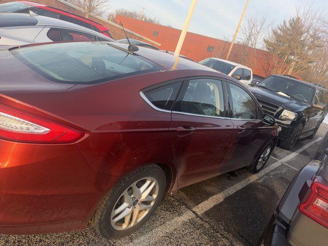 used 2014 Ford Fusion car, priced at $7,490