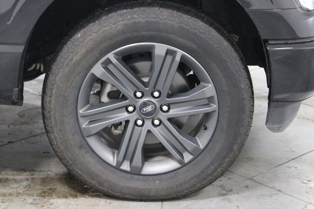 used 2023 Ford F-150 car, priced at $42,828