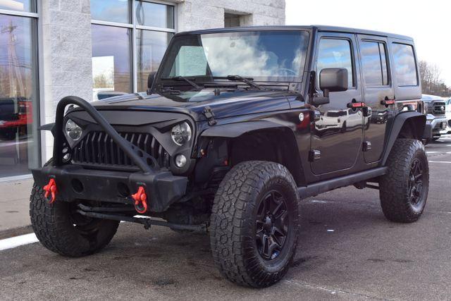 used 2015 Jeep Wrangler Unlimited car, priced at $13,974