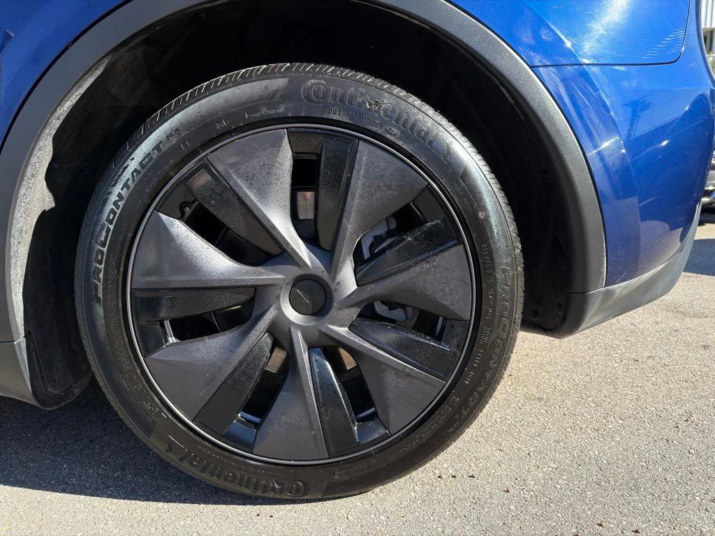 used 2025 Tesla Model Y car, priced at $37,999