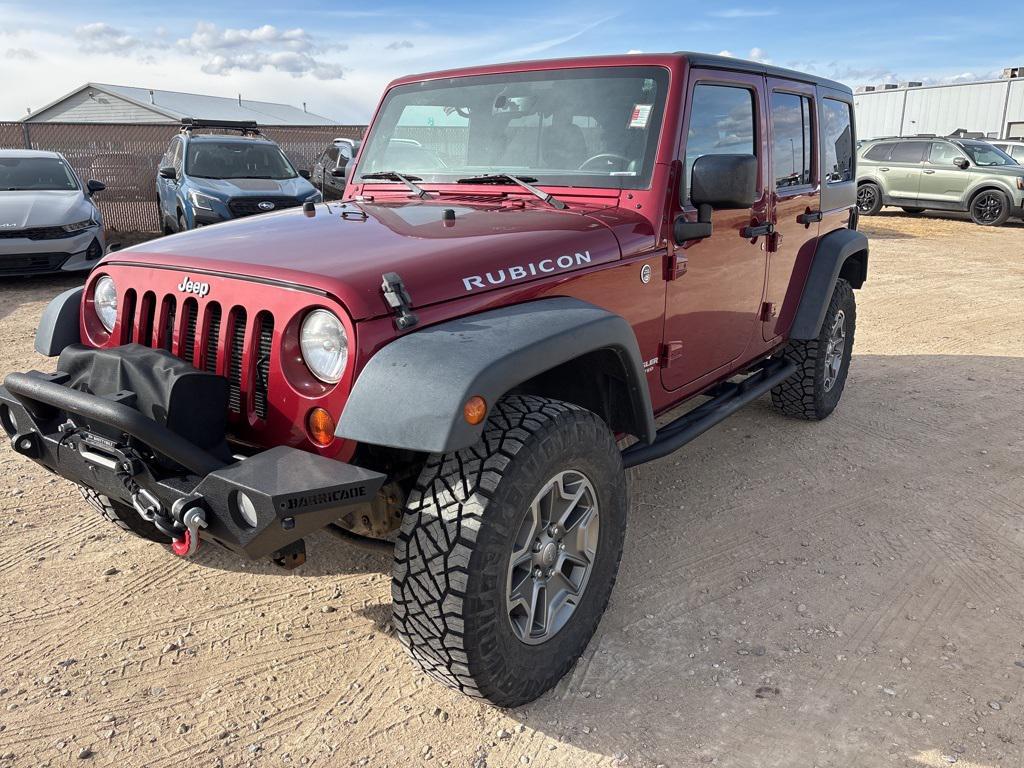 used 2013 Jeep Wrangler Unlimited car, priced at $19,301