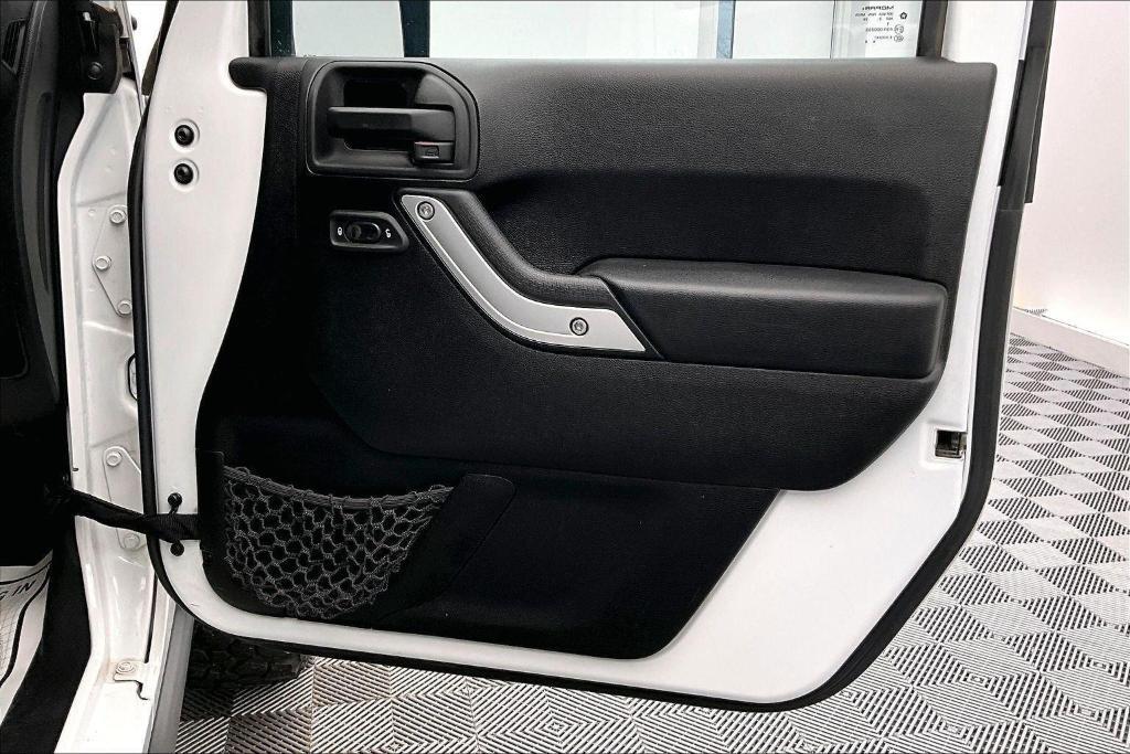 used 2014 Jeep Wrangler Unlimited car, priced at $19,788