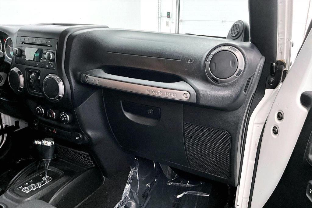 used 2012 Jeep Wrangler Unlimited car, priced at $15,749