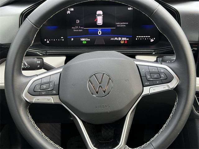 used 2025 Volkswagen Taos car, priced at $23,198