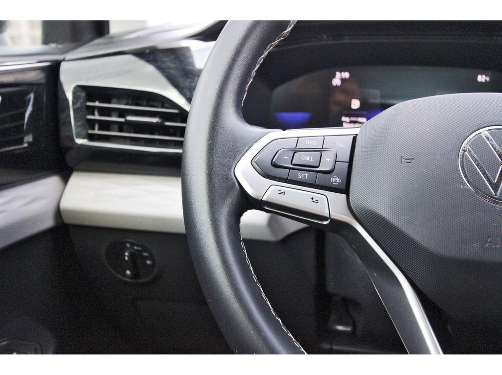 used 2023 Volkswagen Taos car, priced at $16,671