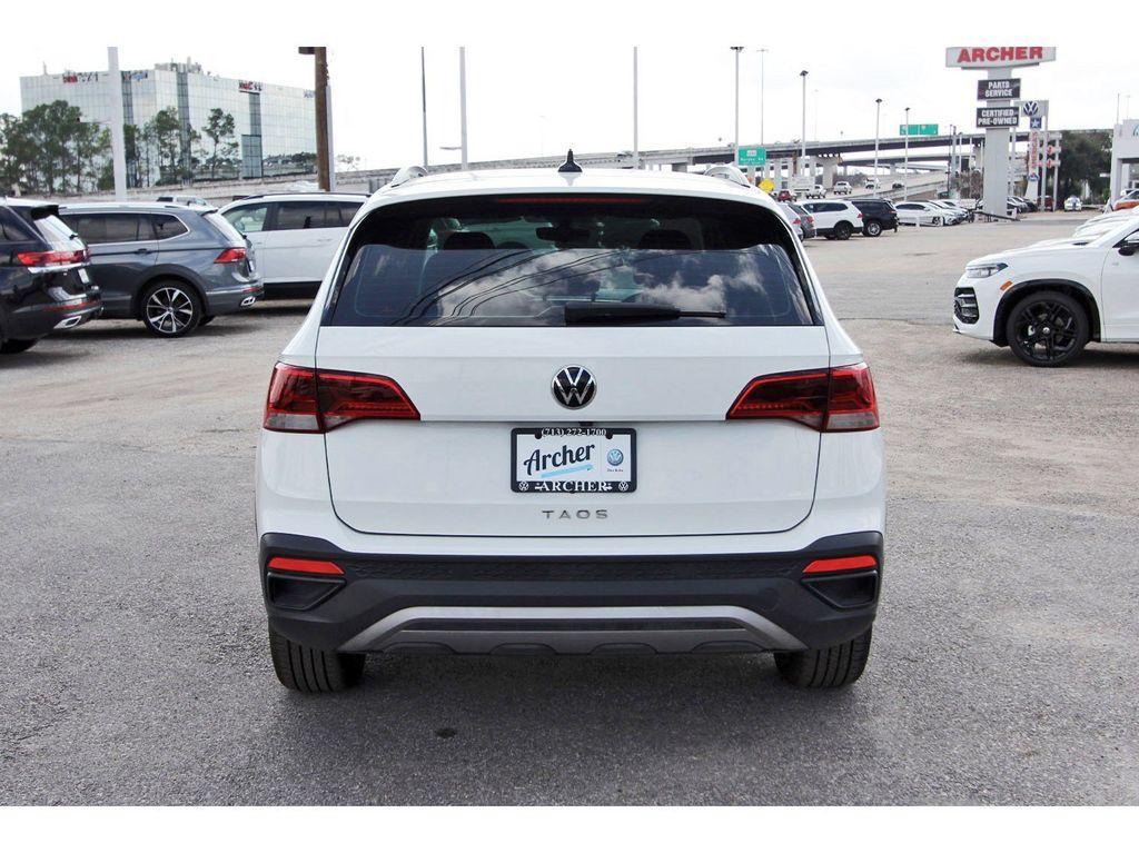 used 2023 Volkswagen Taos car, priced at $16,671