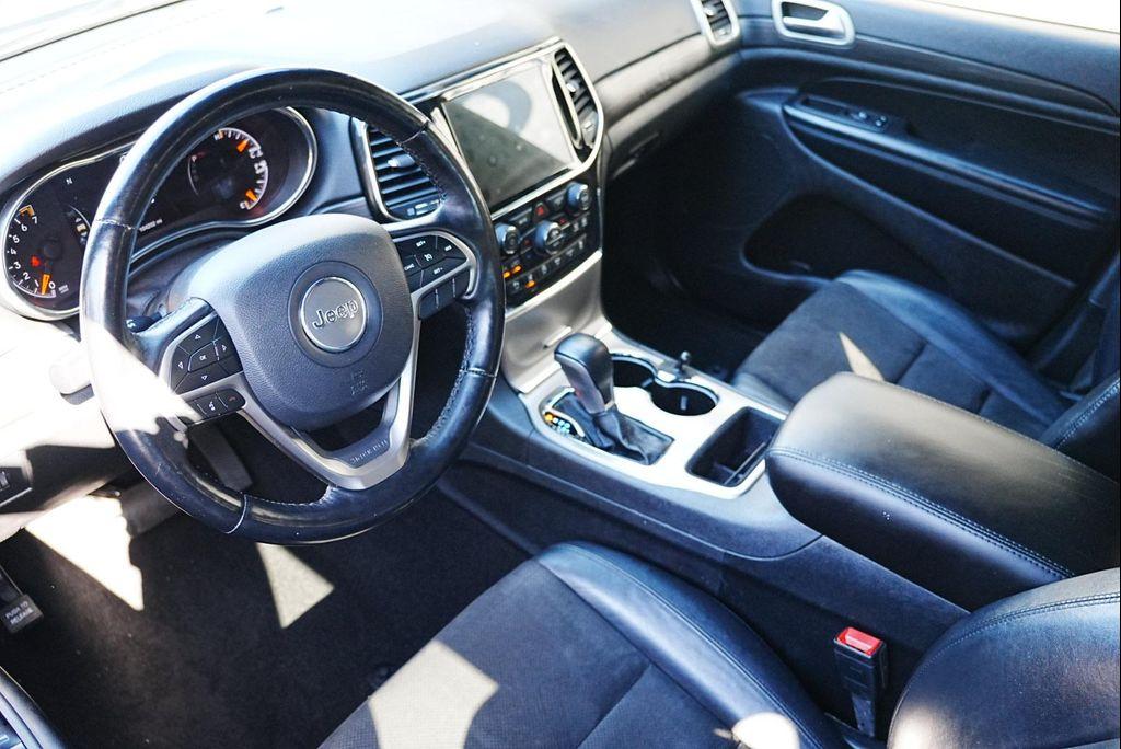 used 2021 Jeep Grand Cherokee car, priced at $17,144