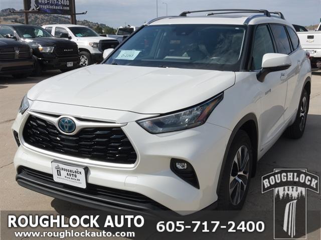used 2020 Toyota Highlander Hybrid car, priced at $30,455