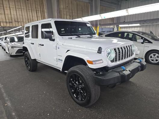 used 2024 Jeep Wrangler 4xe car, priced at $27,175