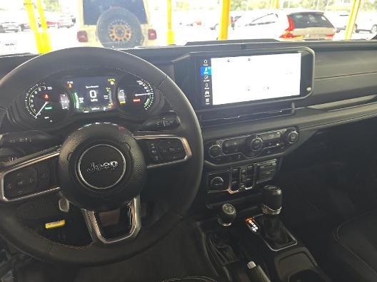 used 2024 Jeep Wrangler 4xe car, priced at $28,671
