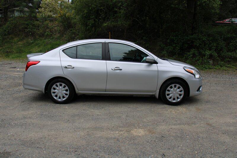 used 2015 Nissan Versa car, priced at $5,699