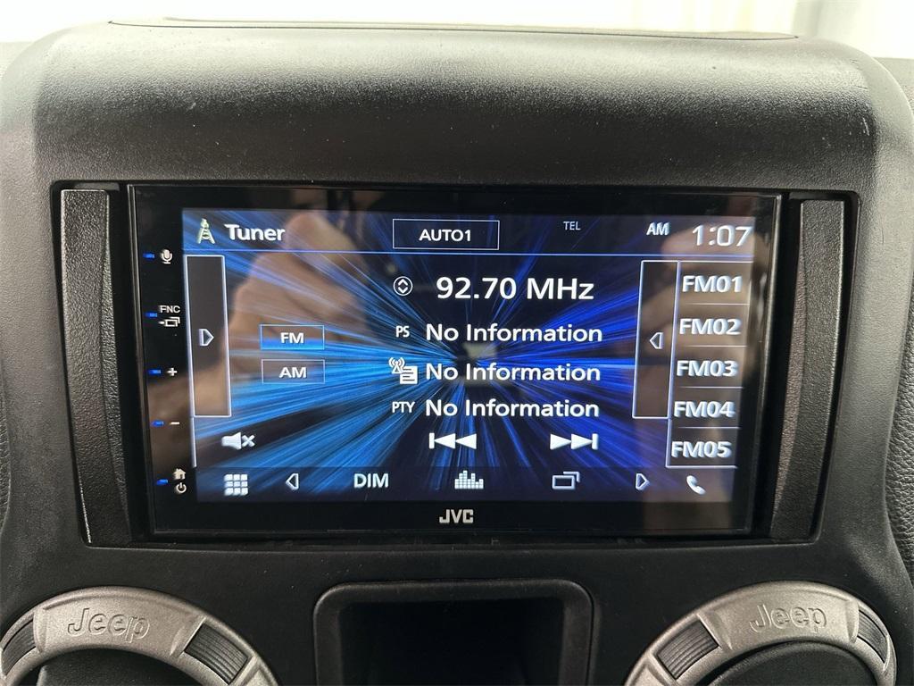 used 2015 Jeep Wrangler Unlimited car, priced at $18,601