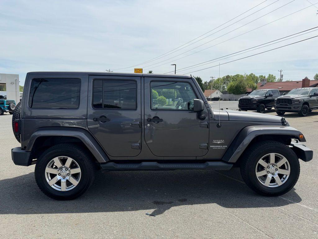 used 2014 Jeep Wrangler Unlimited car, priced at $14,277