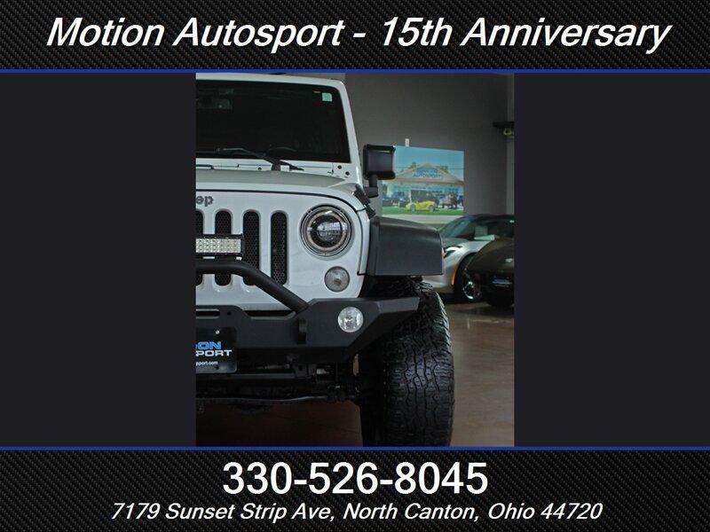 used 2015 Jeep Wrangler Unlimited car, priced at $15,989