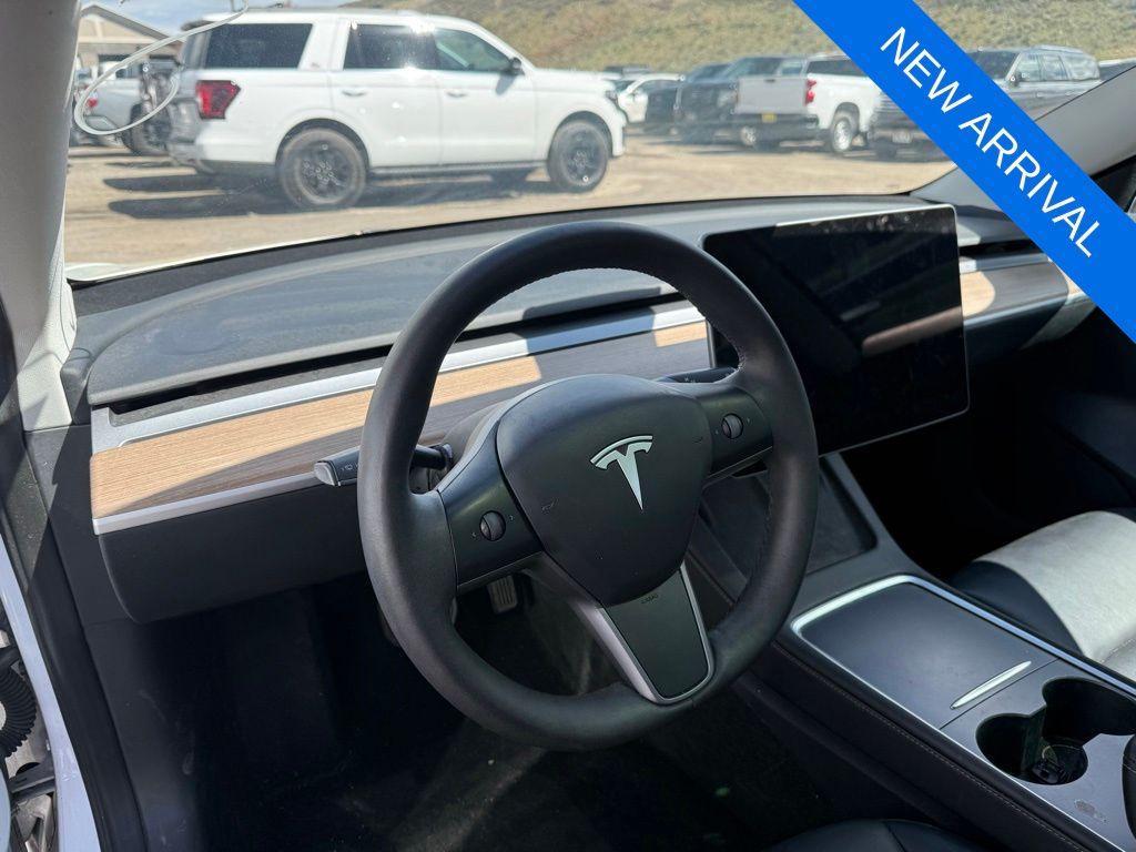 used 2023 Tesla Model 3 car, priced at $27,941