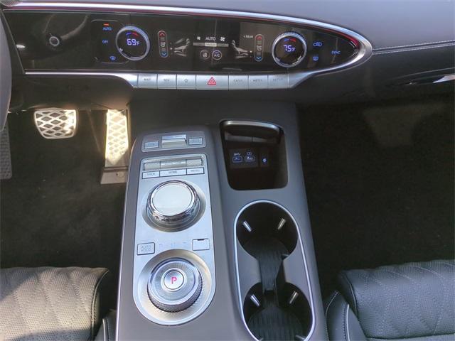 used 2025 Genesis GV70 car, priced at $57,862
