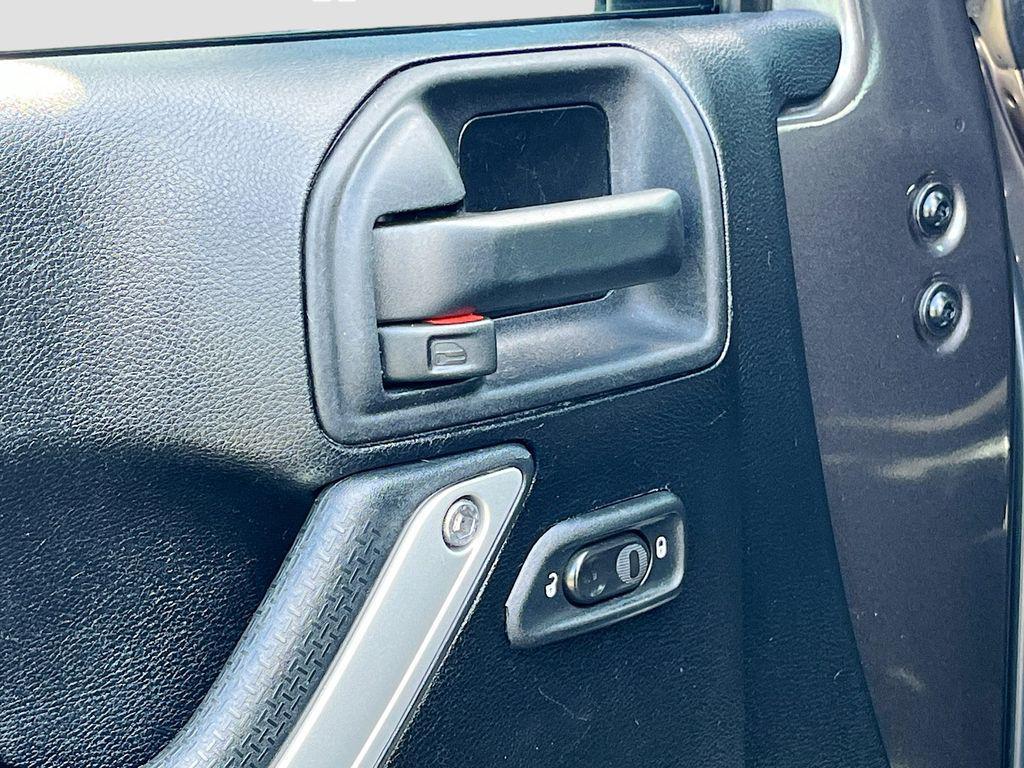 used 2014 Jeep Wrangler Unlimited car, priced at $18,991