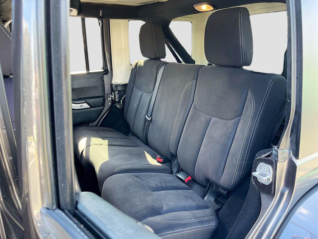 used 2014 Jeep Wrangler Unlimited car, priced at $18,991