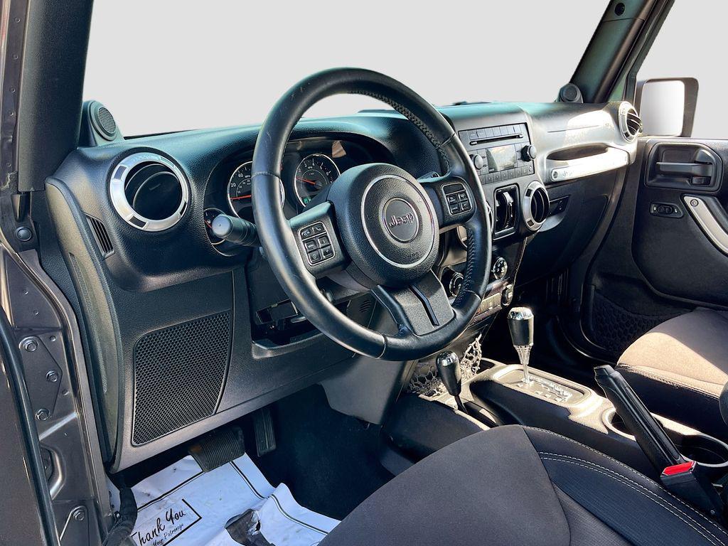 used 2014 Jeep Wrangler Unlimited car, priced at $18,991