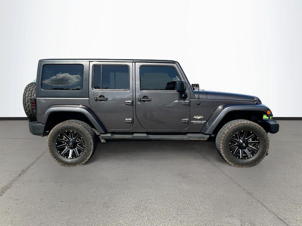 used 2014 Jeep Wrangler Unlimited car, priced at $18,991