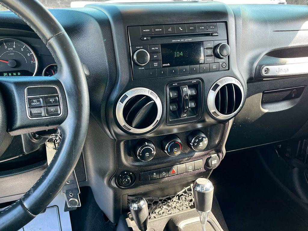 used 2014 Jeep Wrangler Unlimited car, priced at $18,991