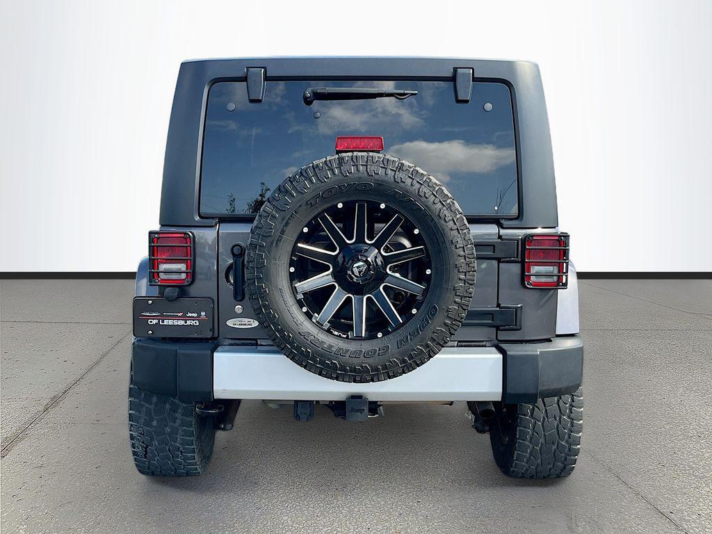 used 2014 Jeep Wrangler Unlimited car, priced at $18,991