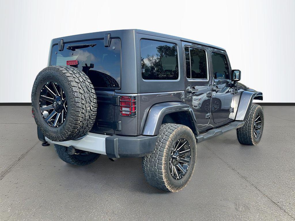 used 2014 Jeep Wrangler Unlimited car, priced at $18,991