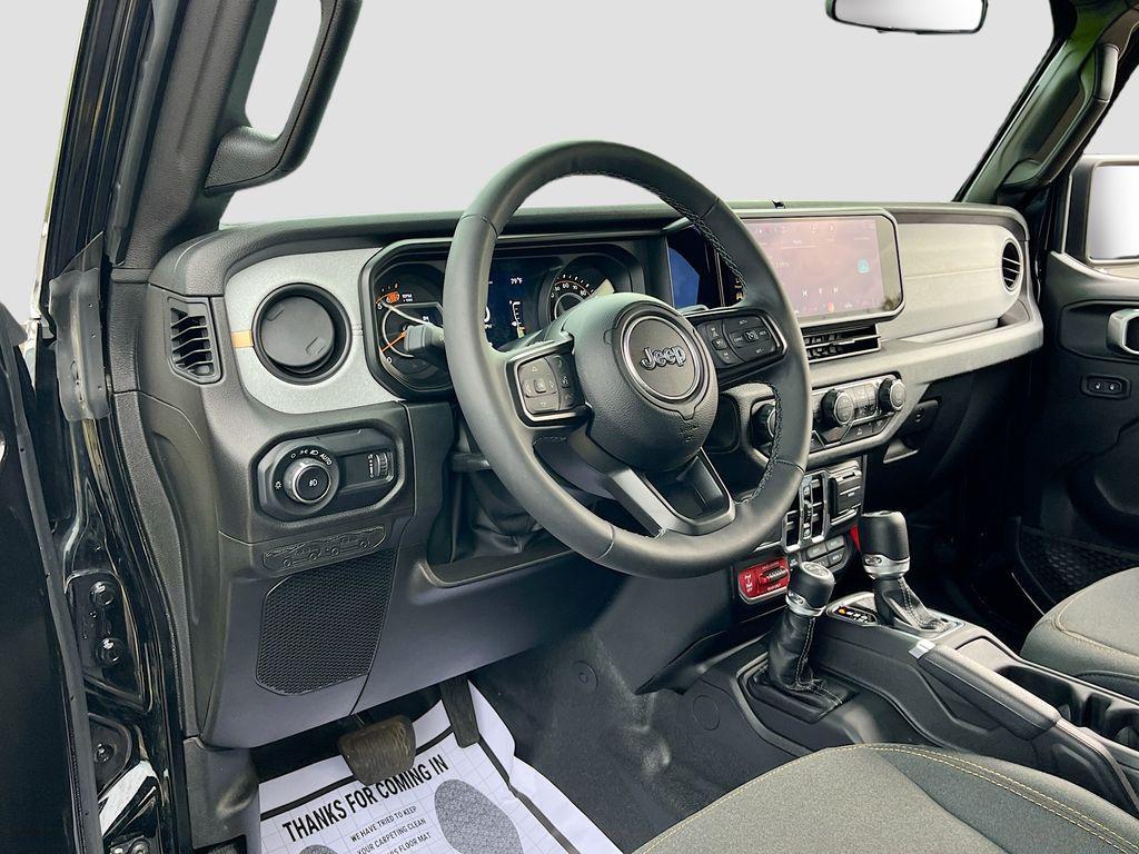 used 2025 Jeep Wrangler car, priced at $37,976