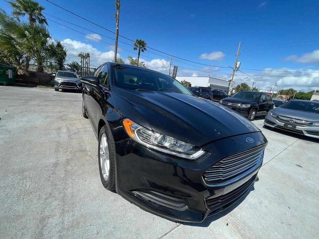 used 2014 Ford Fusion car, priced at $3,290