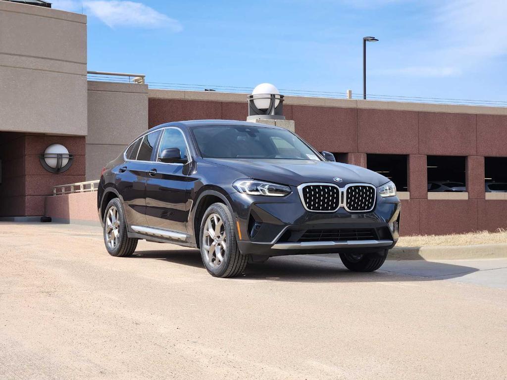 used 2025 BMW X4 car, priced at $49,990