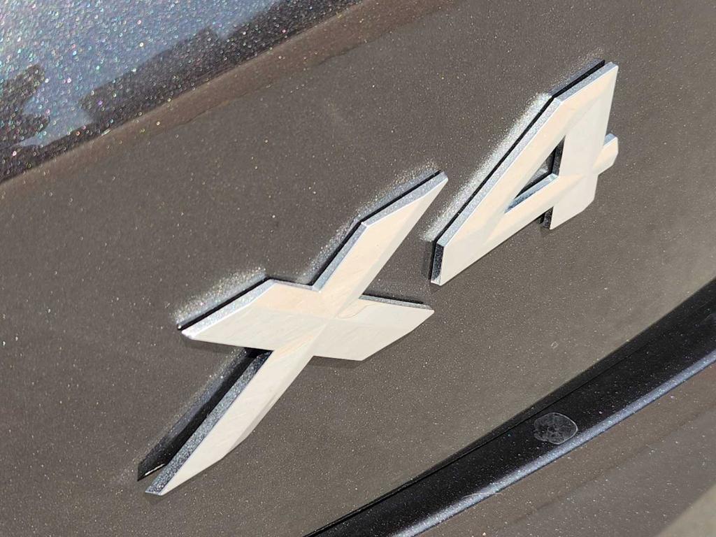 used 2025 BMW X4 car, priced at $49,990