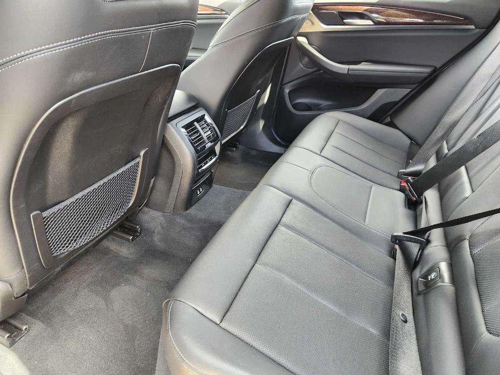 used 2025 BMW X4 car, priced at $49,990