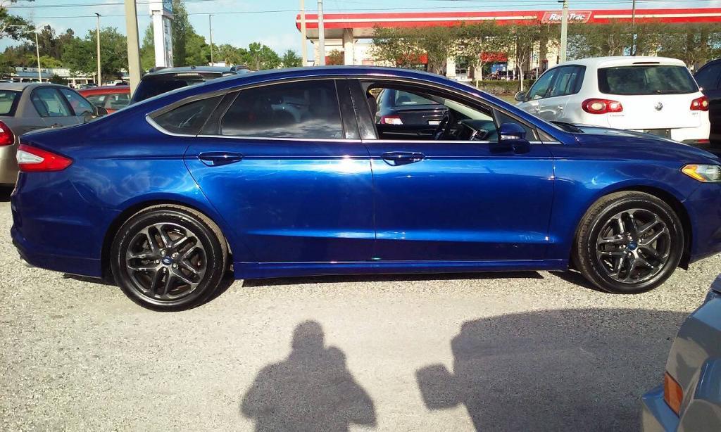 used 2013 Ford Fusion car, priced at $2,298