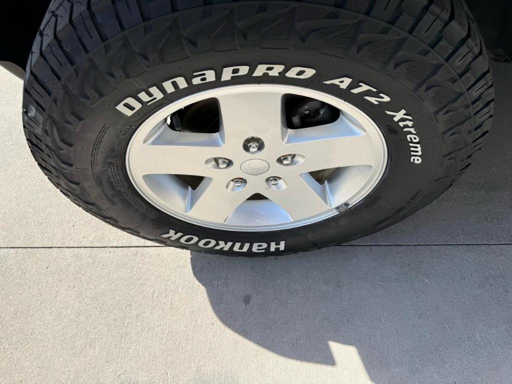 used 2010 Jeep Wrangler Unlimited car, priced at $12,695