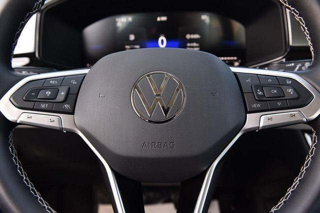 used 2025 Volkswagen Taos car, priced at $22,375
