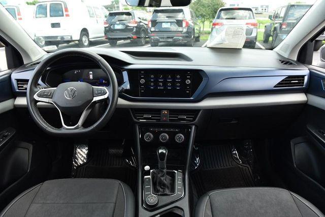 used 2023 Volkswagen Taos car, priced at $24,115