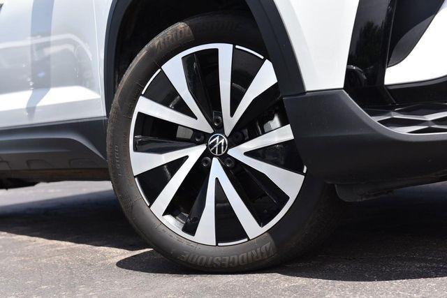 used 2023 Volkswagen Taos car, priced at $21,615