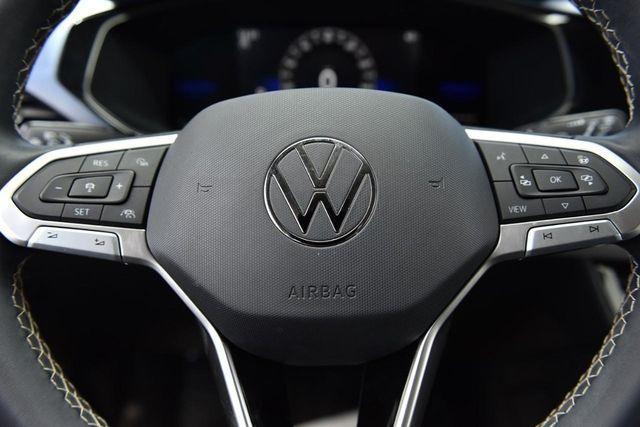 used 2023 Volkswagen Taos car, priced at $21,615
