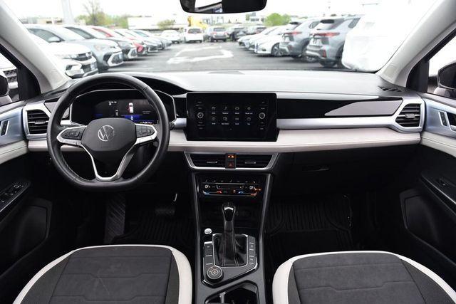 used 2025 Volkswagen Taos car, priced at $24,115