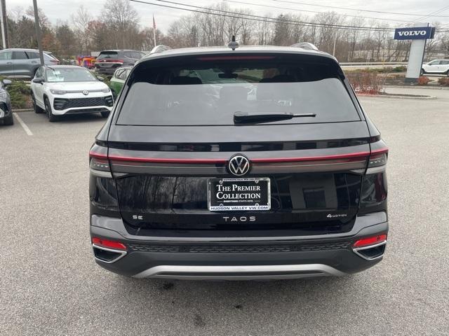 used 2025 Volkswagen Taos car, priced at $26,499