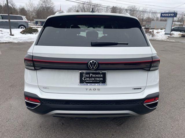 used 2025 Volkswagen Taos car, priced at $27,932
