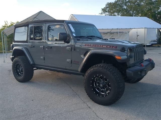 used 2022 Jeep Wrangler Unlimited car, priced at $36,196