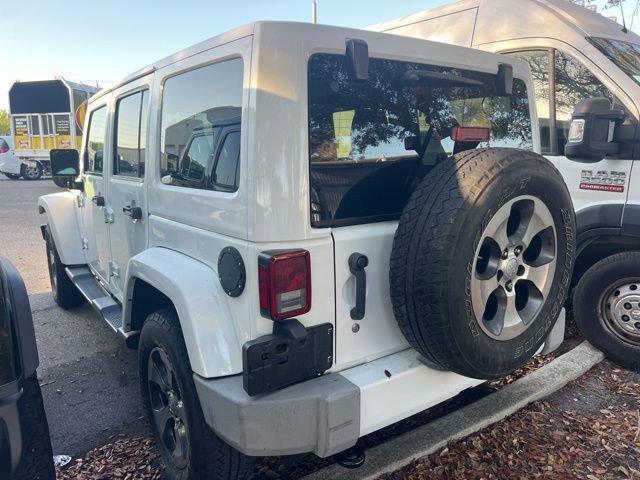 used 2016 Jeep Wrangler Unlimited car, priced at $16,291