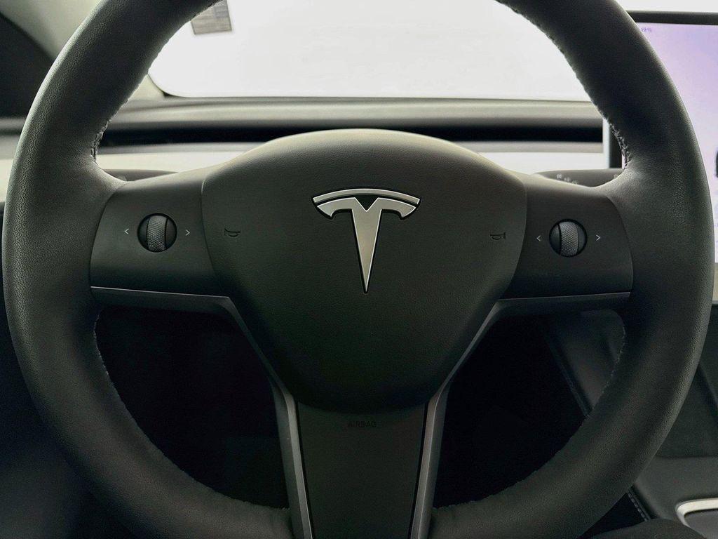 used 2025 Tesla Model Y car, priced at $49,763