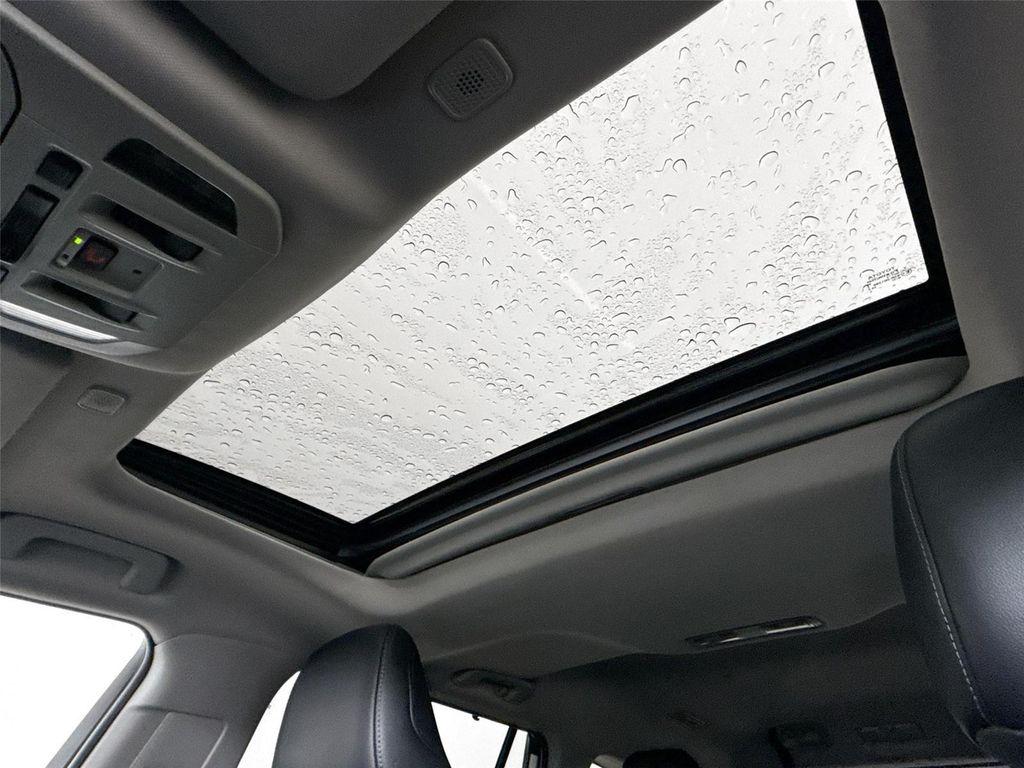 used 2025 Toyota Highlander Hybrid car, priced at $52,500