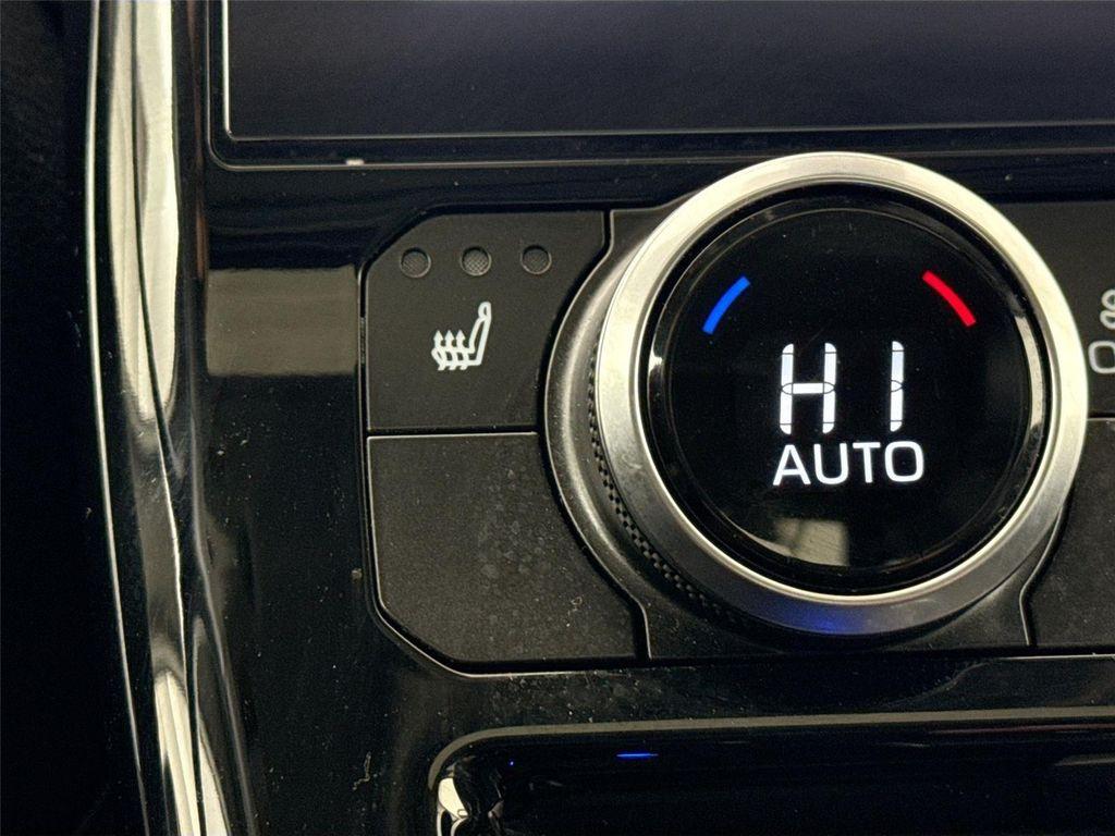 used 2025 Toyota Highlander Hybrid car, priced at $52,500
