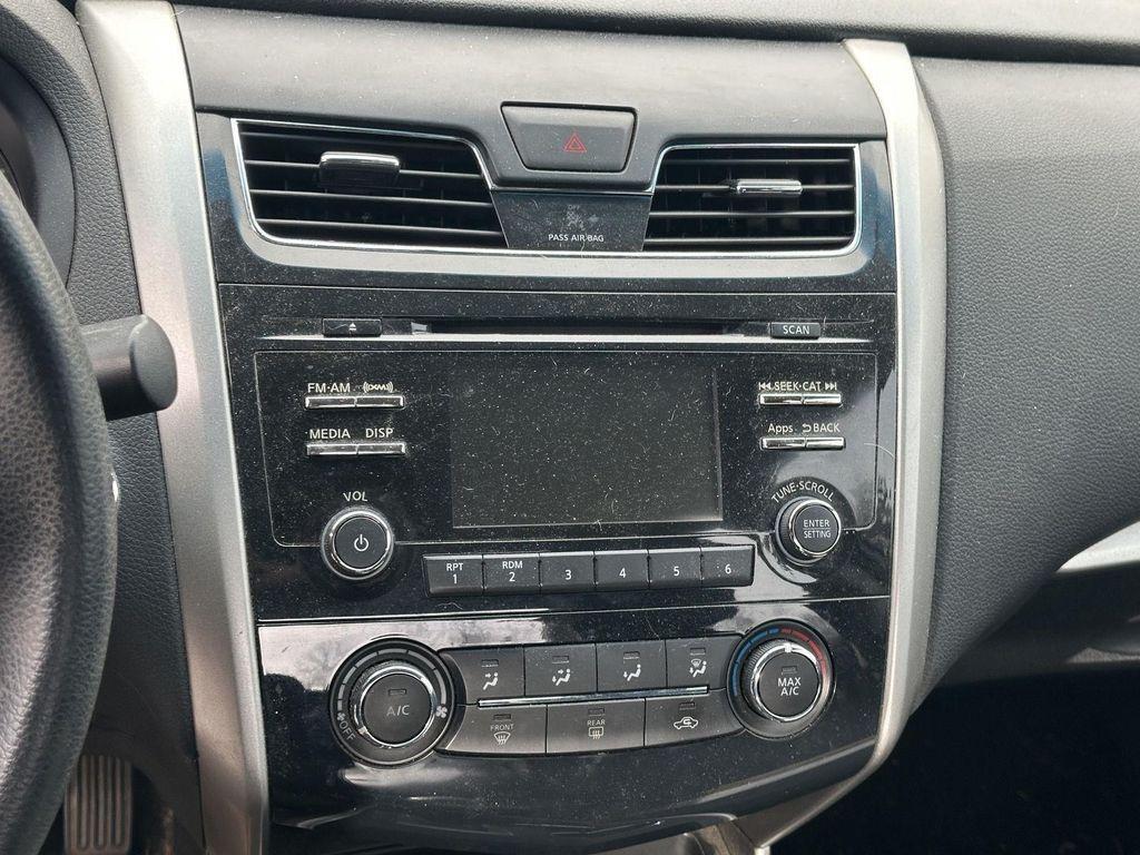 used 2015 Nissan Altima car, priced at $14,000