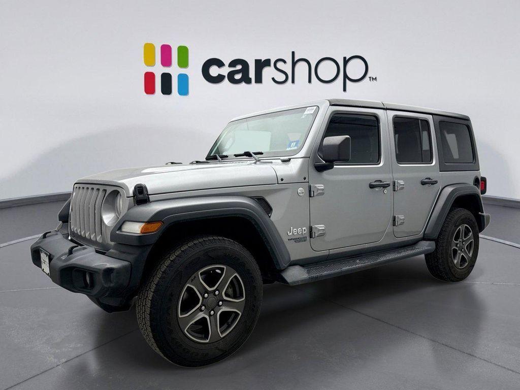 used 2018 Jeep Wrangler Unlimited car, priced at $19,349