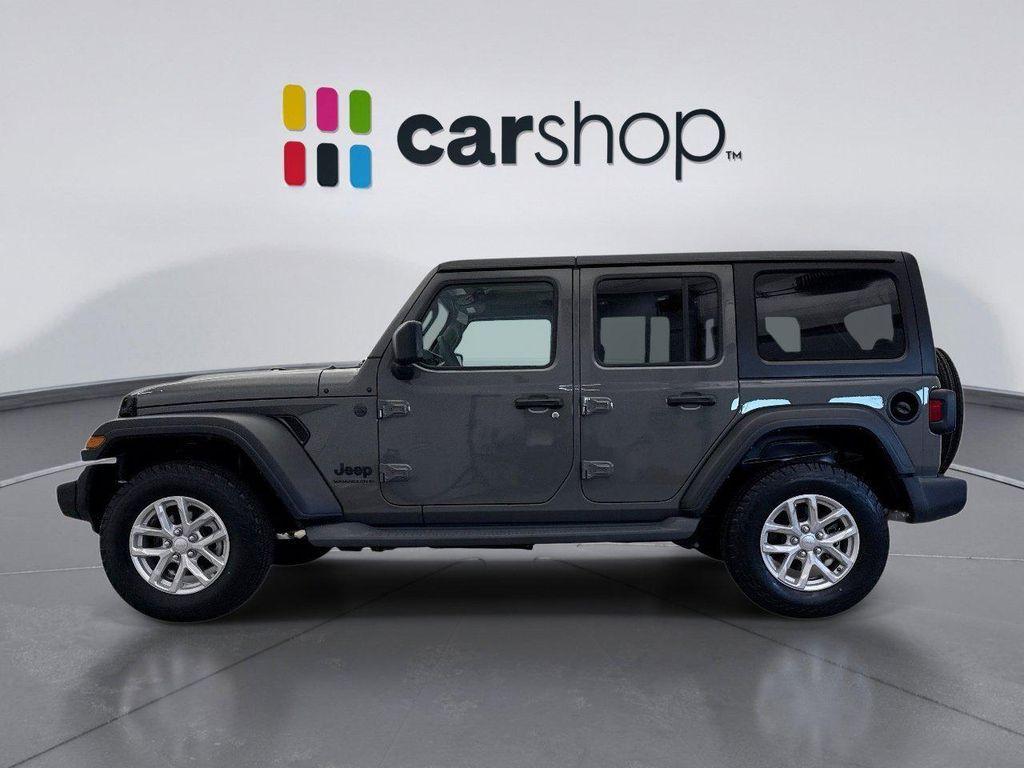 used 2023 Jeep Wrangler car, priced at $28,698