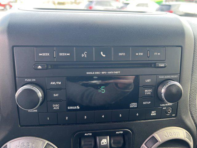 used 2015 Jeep Wrangler Unlimited car, priced at $15,995